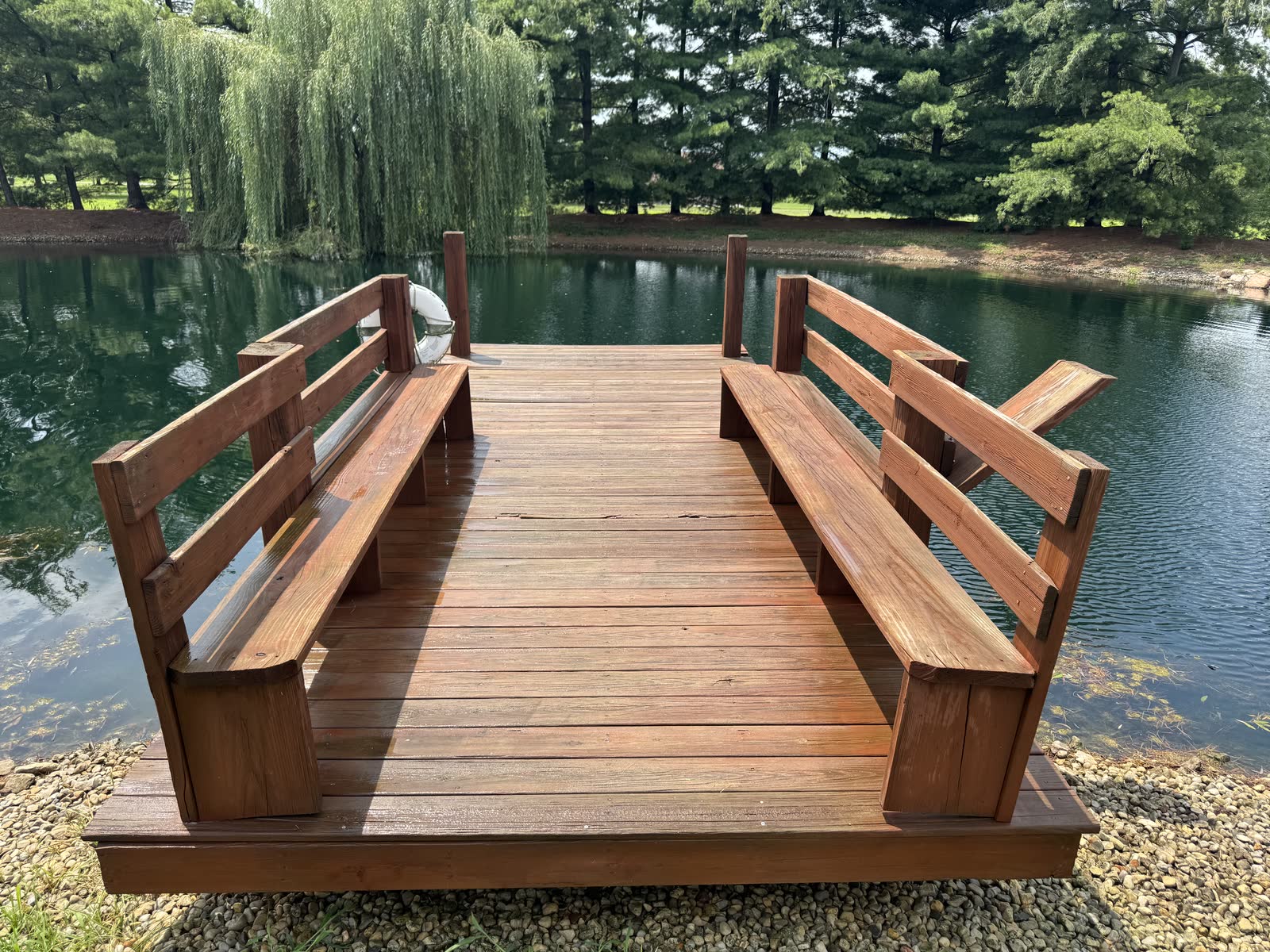 Wood deck cleaned and brightened by soft washing