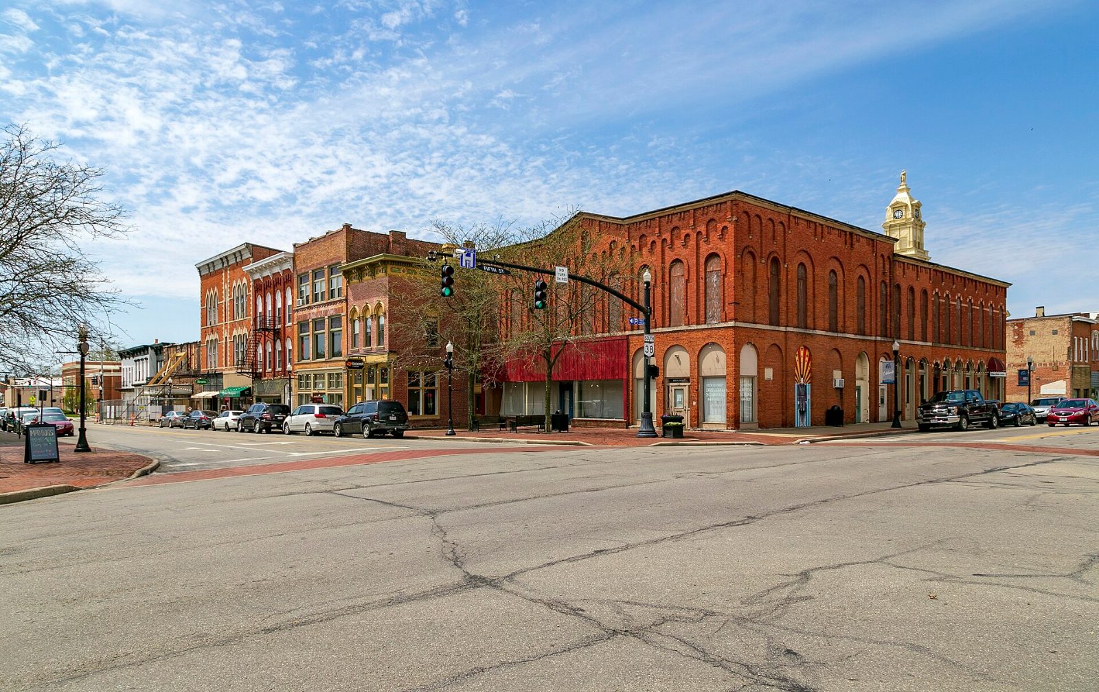 Historic brick storefronts and the Union County Courthouse tower in downtown Marysville, Ohio
